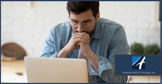 Man Looking Sad at Computer