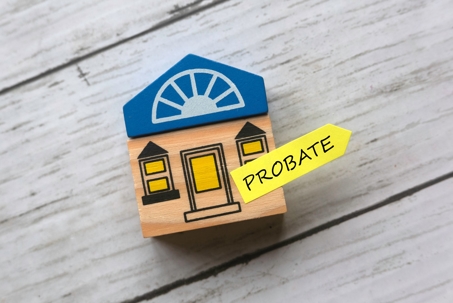 a picture of a little house with a sticky note that says "probate" on it