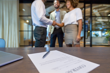 two people shaking hands and nonjudicial settlement agreement